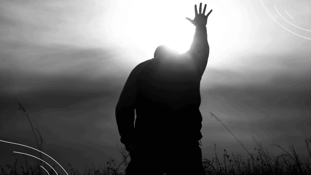 Prayers for the month of June (7) black and white photo of man reaching out in prayer