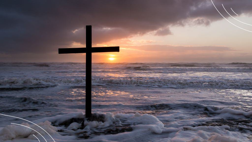 July Prayer - (7) cross standing in middle of an ocean