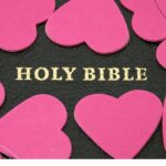 Valentines Day Bible Verses (12) hearts surrounding a holy Bible