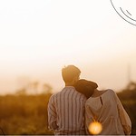 Prayer for Marriage Protection - couple standing in field looking at sunset