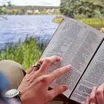 2 - woman reading Bible - Bible verses for August