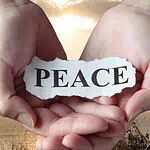 2 - hands holding a paper that says peace - prayers for peace and comfort