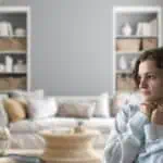 1 - woman thinking in a living room - seeking Gods wisdom Bible reading plan for beginners